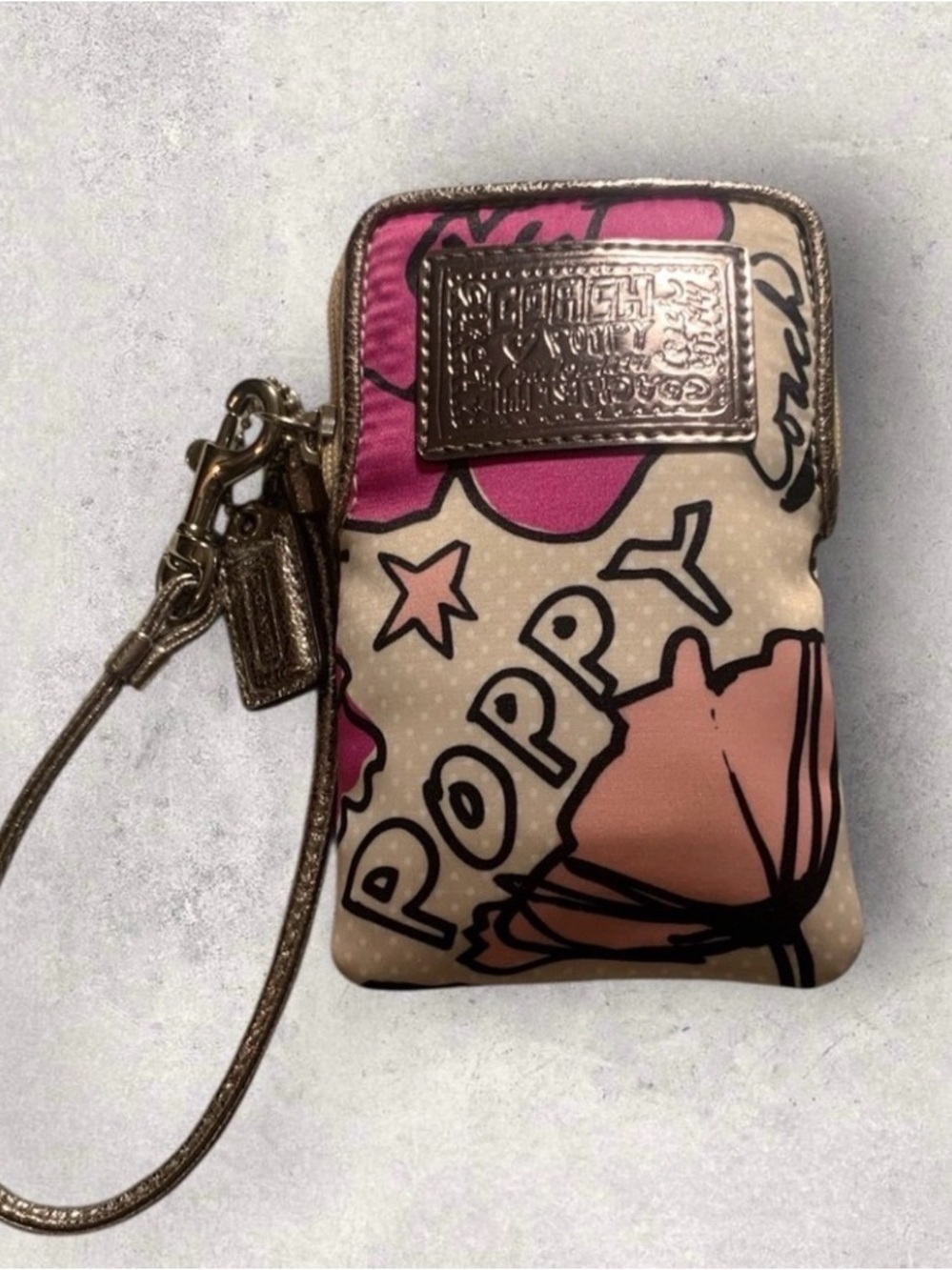 Coach Floral Poppy Wristlet in Pink and Metallic Gold